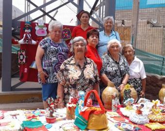 Picture of the elderly group with their handcrafts.

&nbsp;
